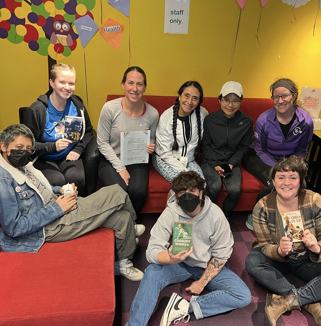 8 people sitting on couches after the first Girls in 3-B run